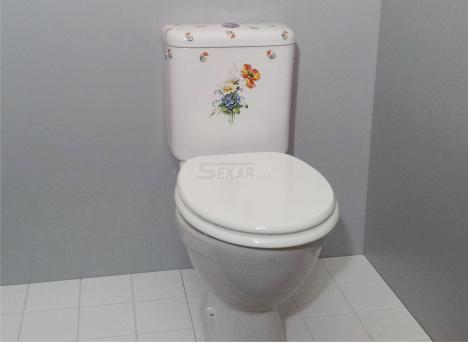 Toaleta s dekorovanou nádrží - Kliknutím zobrazíte detail obrázku.